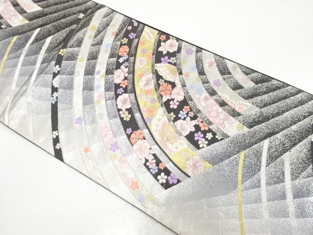 Woven sak obi with butterfly, camellia, and plum tree pattern